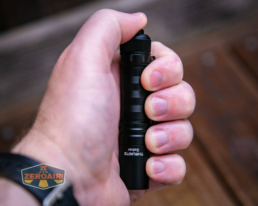 Thrunite Saber EDC pocket flashlight in hand