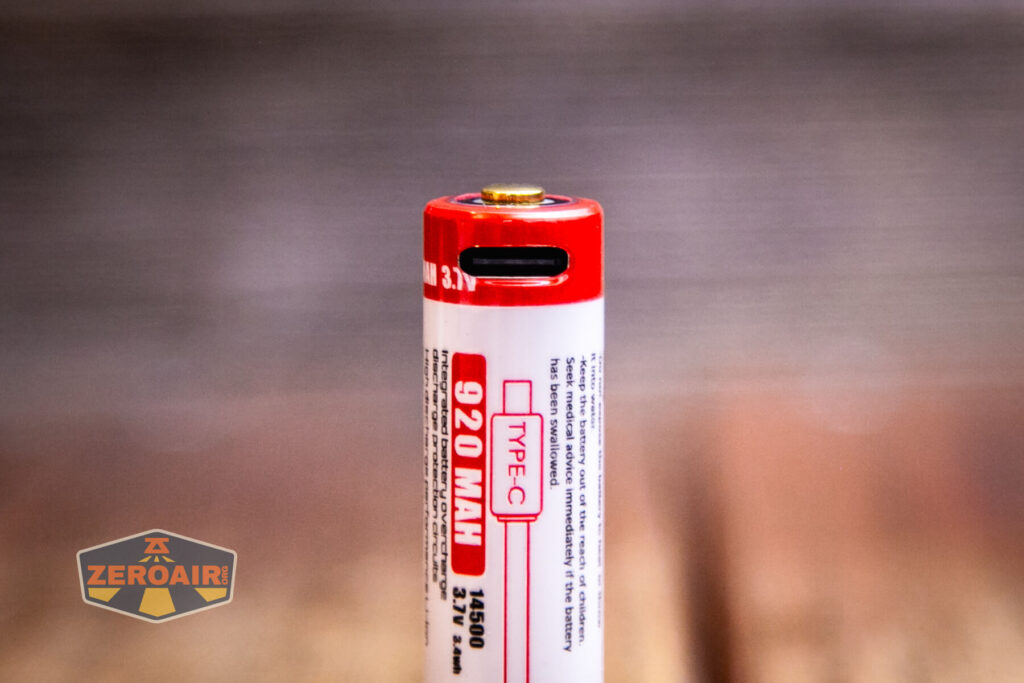 Thrunite Saber EDC pocket flashlight charging port on cell