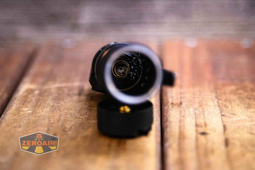 Wuben L1 dual beam flashlight positive end spring in tube