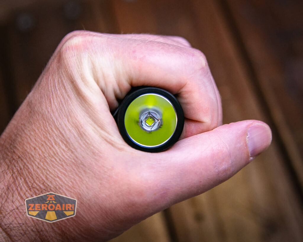 Wuben L1 dual beam flashlight in hand