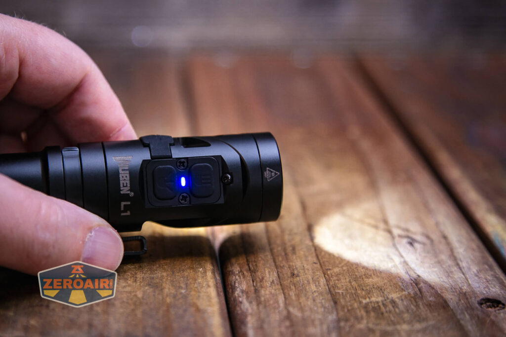 Wuben L1 dual beam flashlight emitter on and indicator in blue