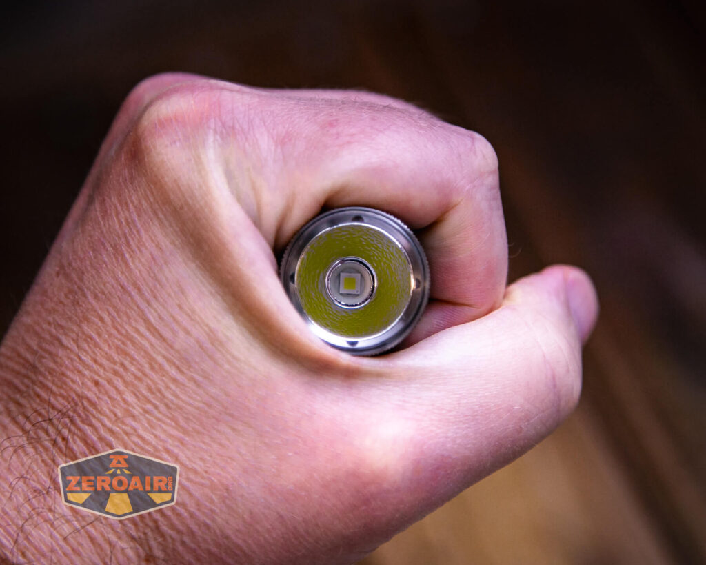 Gift Glow A1 reflector flashlight in hand