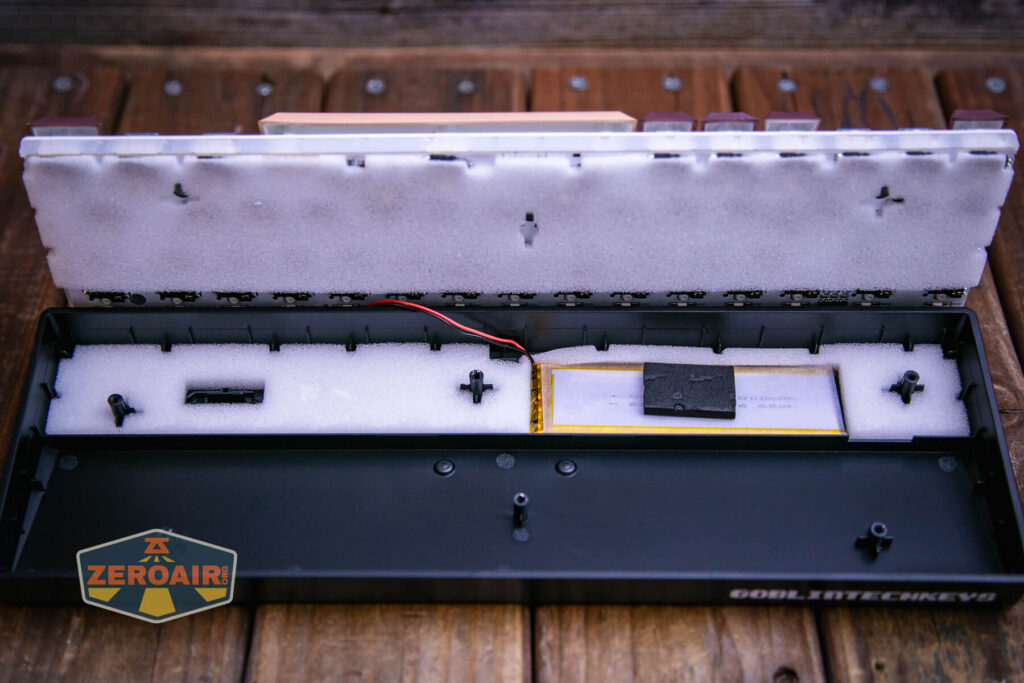 Goblintechkeys Alpha 68 mechanical keyboard showing inside of case with battery
