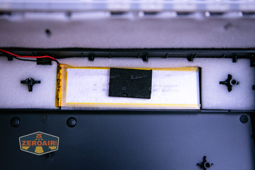 Goblintechkeys Alpha 68 mechanical keyboard showing inside of case with battery