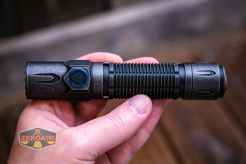 Olight Warrior 3S stonewashed titanium in hand