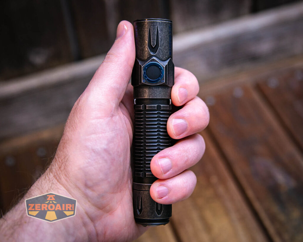 Olight Warrior 3S stonewashed titanium in hand