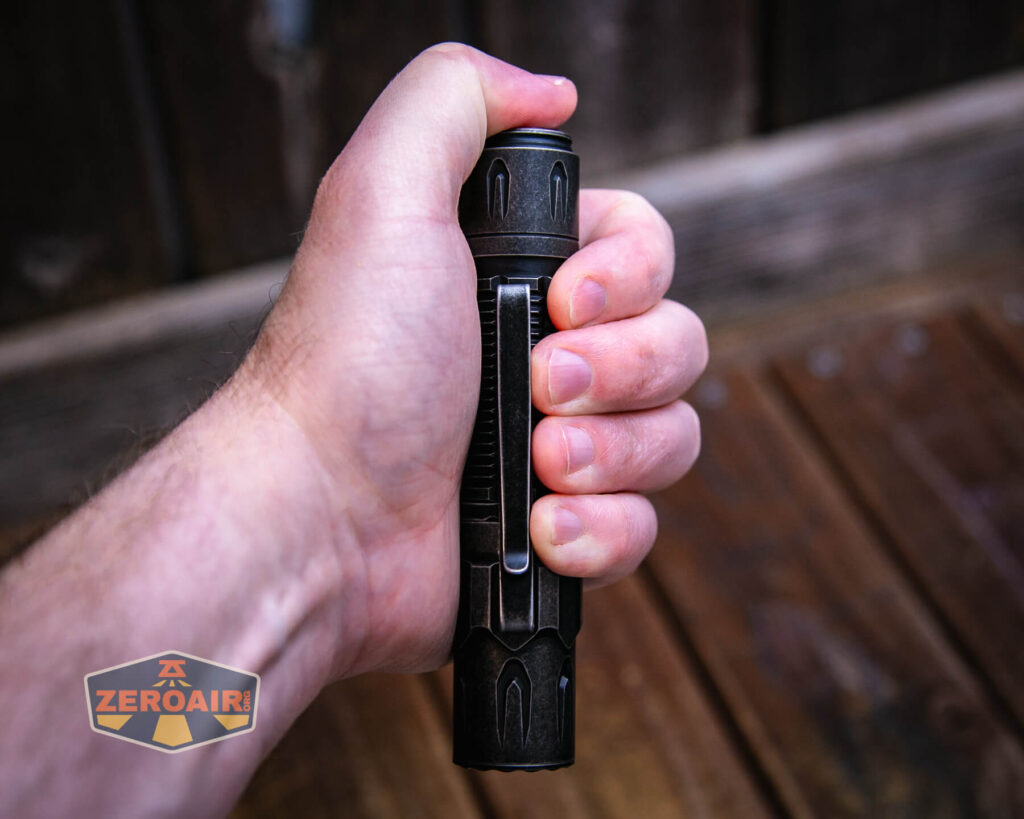 Olight Warrior 3S stonewashed titanium in hand