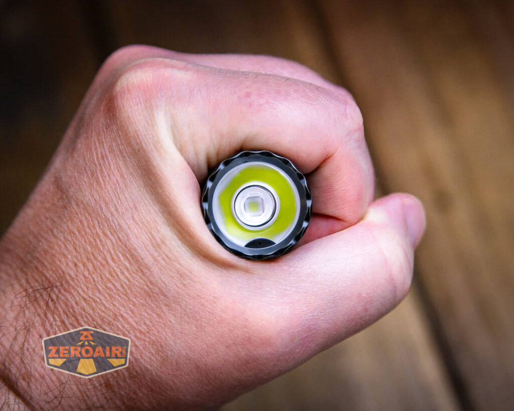 Olight Warrior 3S stonewashed titanium in hand
