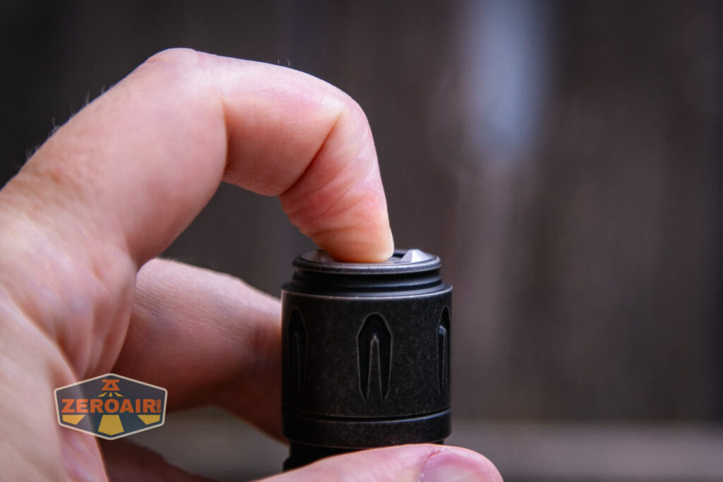 Olight Warrior 3S stonewashed titanium tail switch actuation