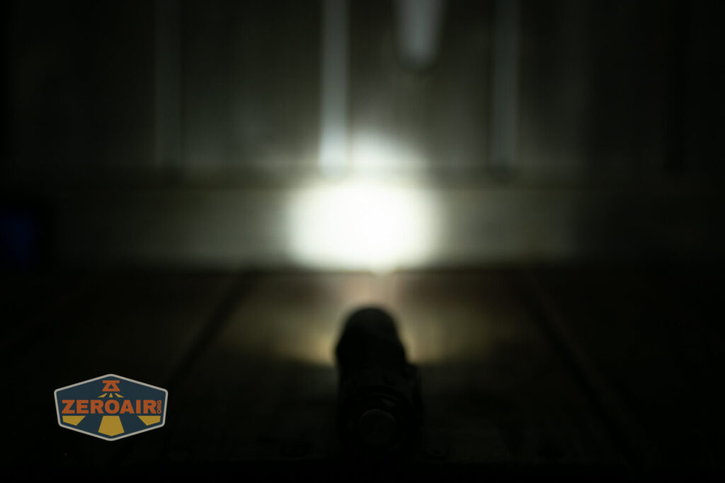 Olight Warrior 3S stonewashed titanium emitter on