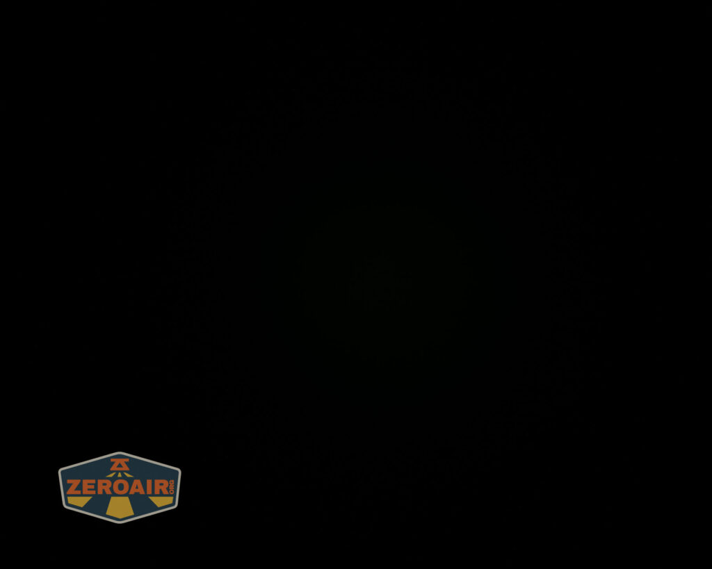 A completely black image with a small ZeroAir logo in the lower left corner. No other details or objects are visible.