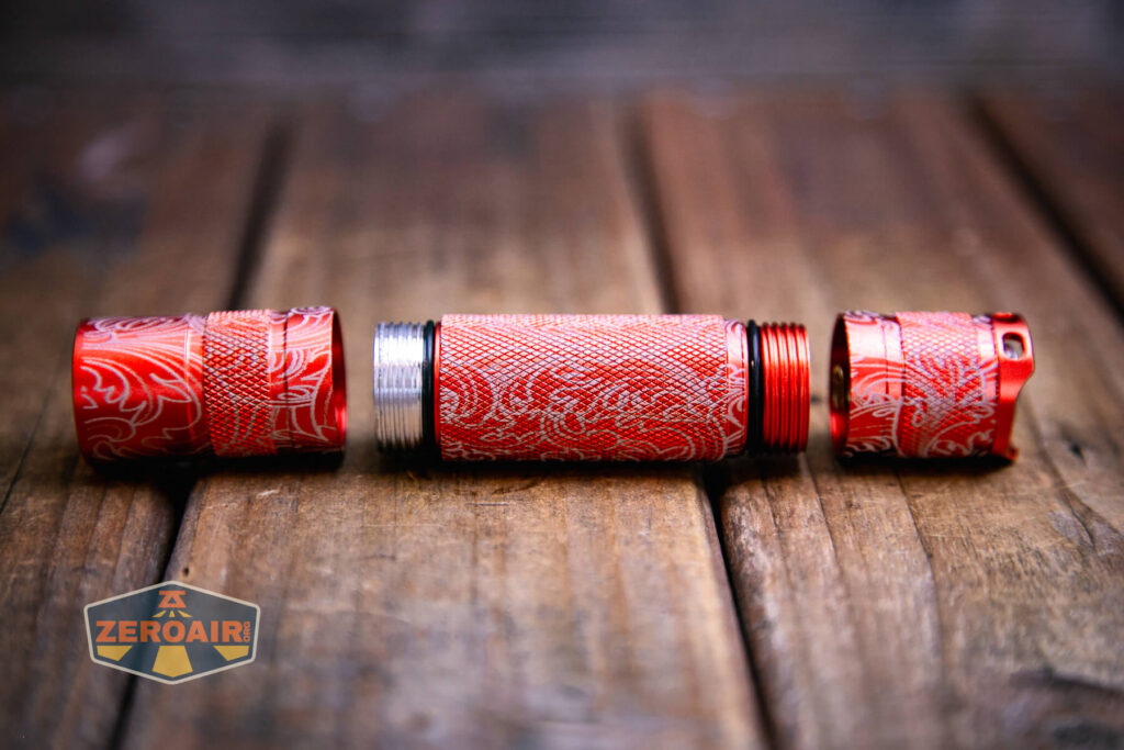 Scrollwork engraved Convoy S2 flashlight head and tail removed