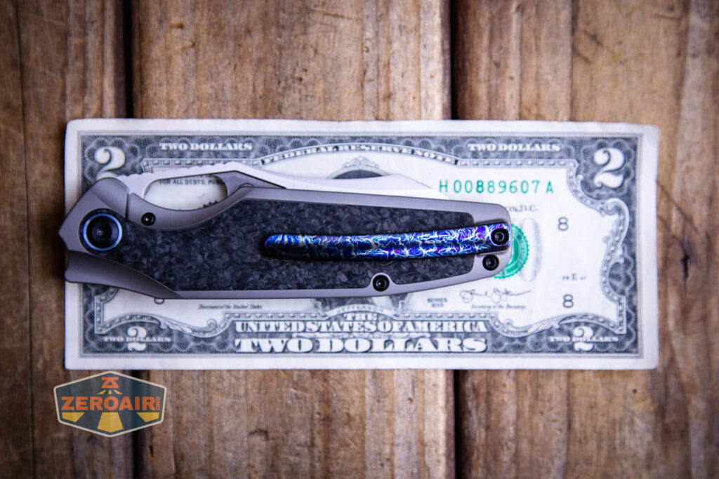 Kansept Tuckamore titanium knife on two dollar bill