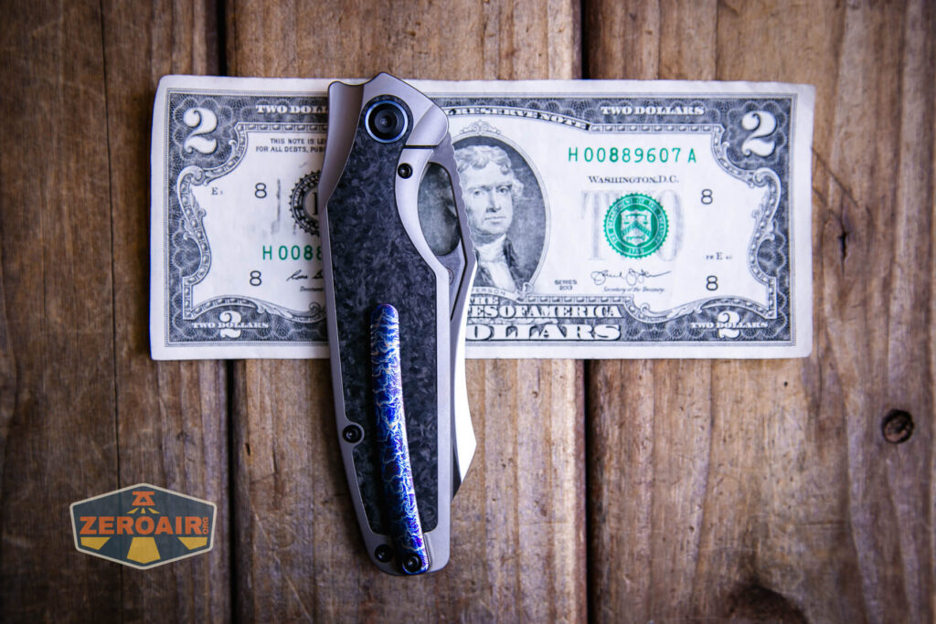 Kansept Tuckamore titanium knife on two dollar bill
