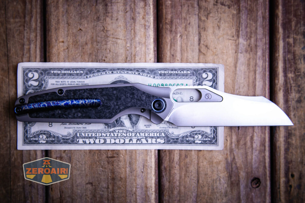 Kansept Tuckamore titanium knife on two dollar bill