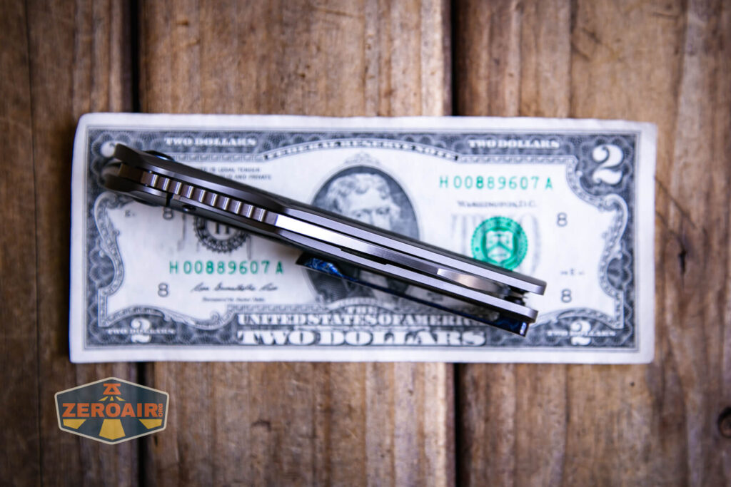 Kansept Tuckamore titanium knife on two dollar bill