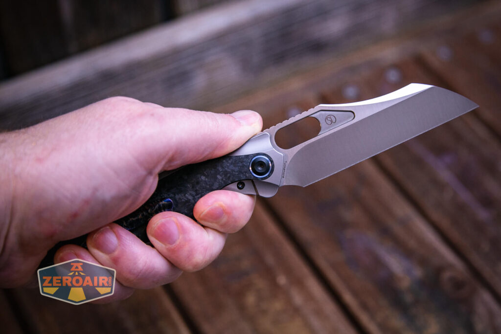 Kansept Tuckamore titanium knife open in hand view