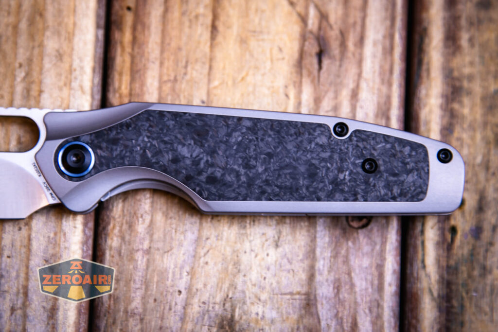Kansept Tuckamore titanium knife scale view of carbon fiber