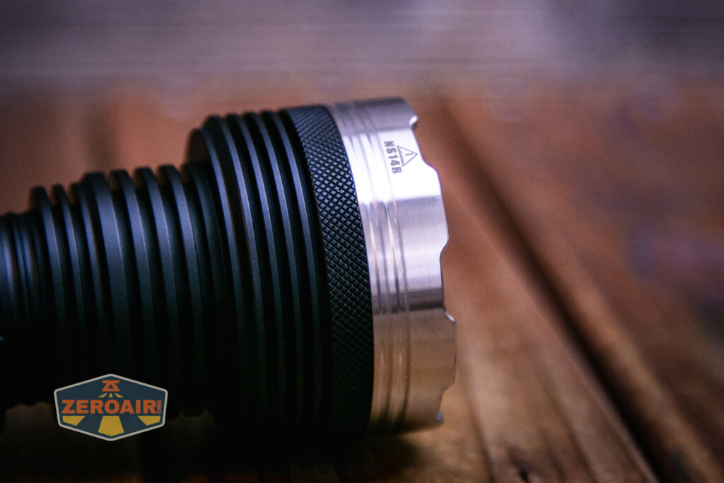 Nightwatch NS14R flood flashlight stainless bezel