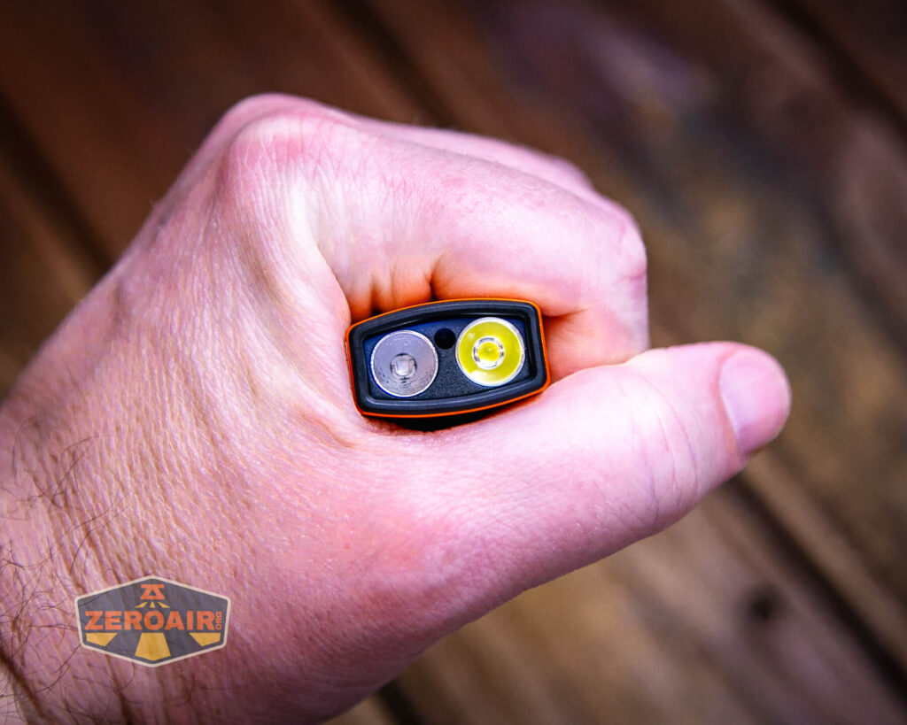 Olight Arkfeld Pro EDC flashlight in hand