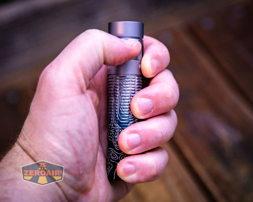 Olight Baton 3 Pro Silver Ridge in hand