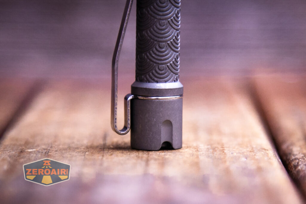 ReyLight Pineapple Mini Seigaiha flashlight in titanium tailcap and pattern detail