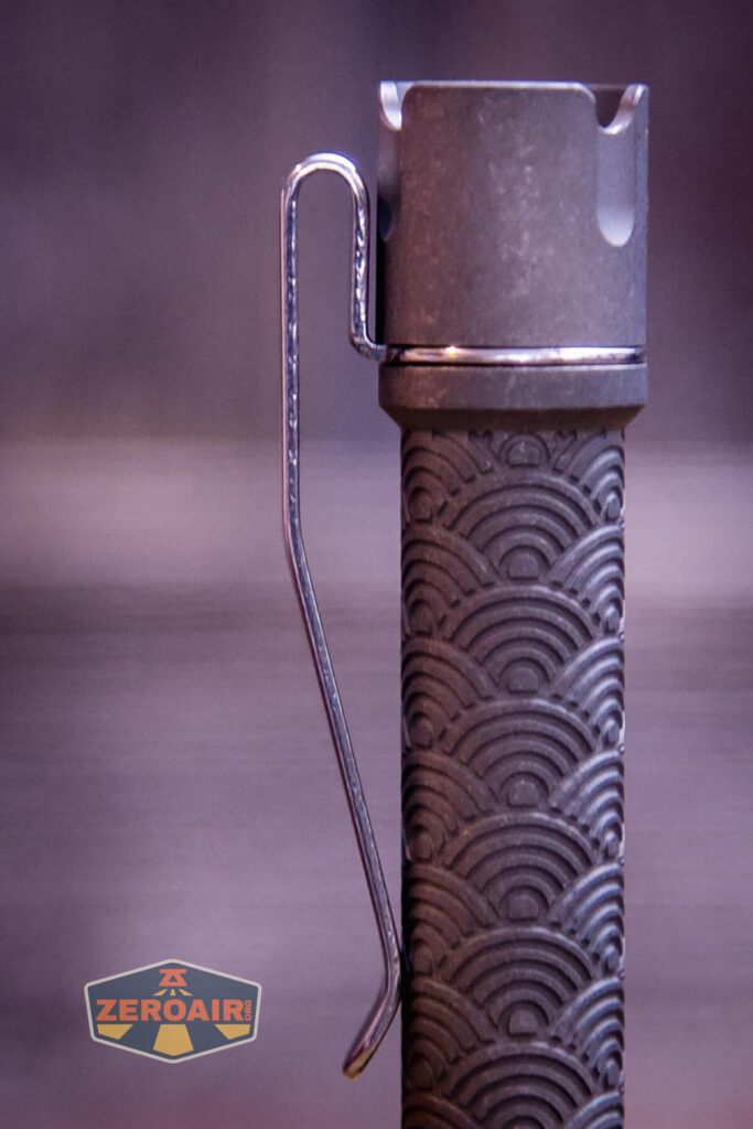 ReyLight Pineapple Mini Seigaiha flashlight in titanium pocket clip detail
