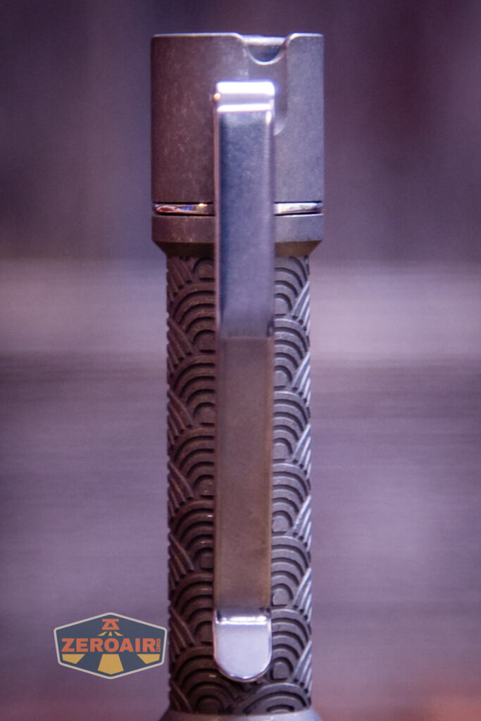 ReyLight Pineapple Mini Seigaiha flashlight in titanium pocket clip detail