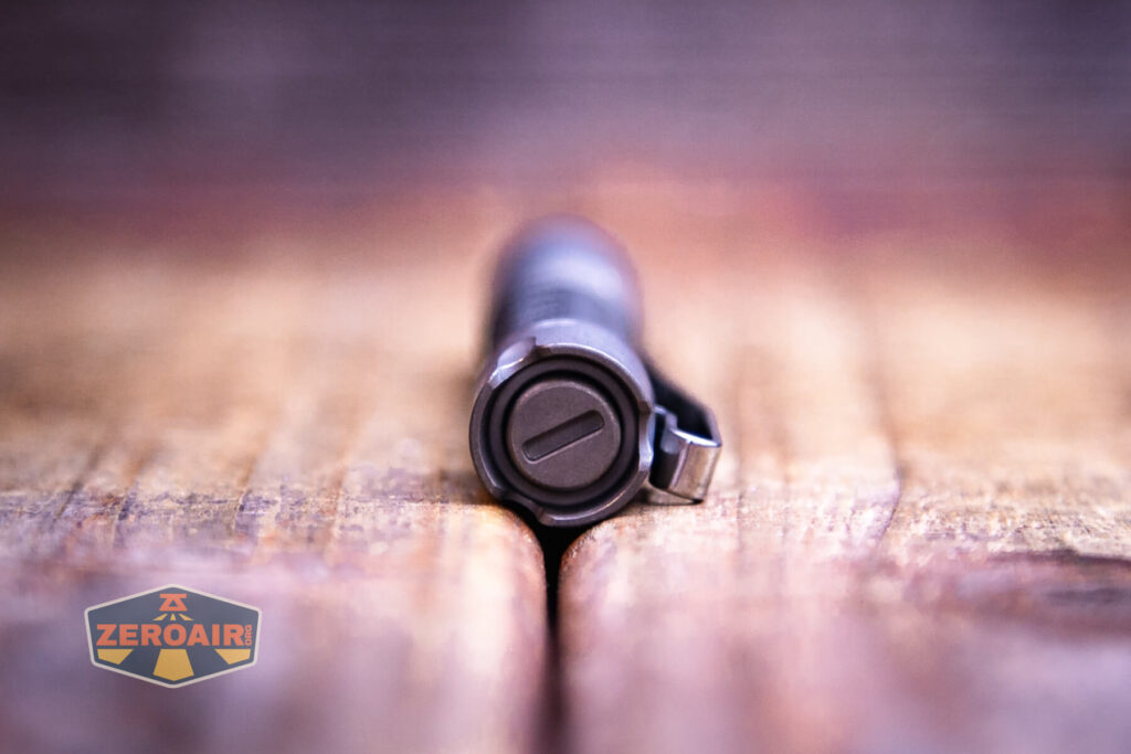 ReyLight Pineapple Mini Seigaiha flashlight in titanium switch detail