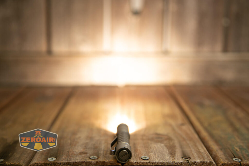 ReyLight Pineapple Mini Seigaiha flashlight in titanium emitter on