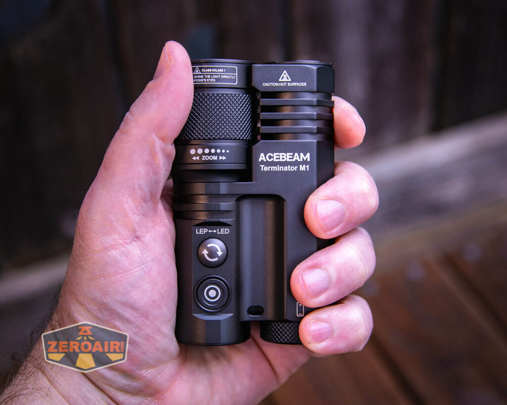 Acebeam Terminator M1 flashlight in hand