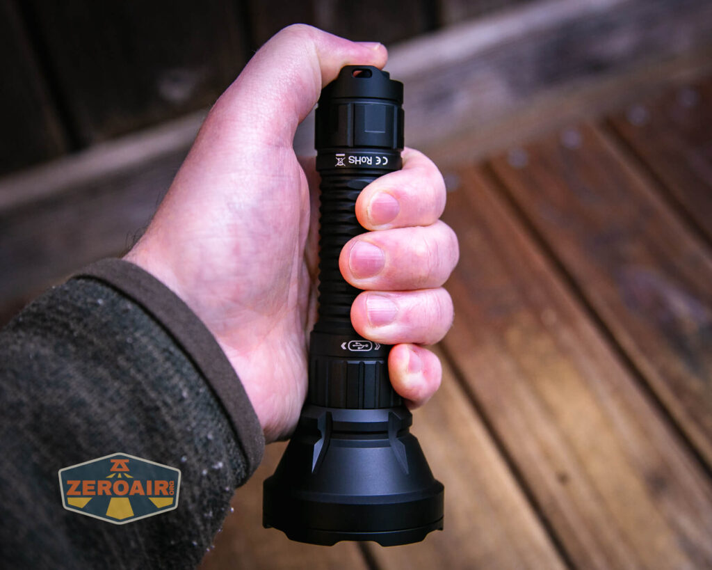 Sofirn SF26 tactical flashlight in hand