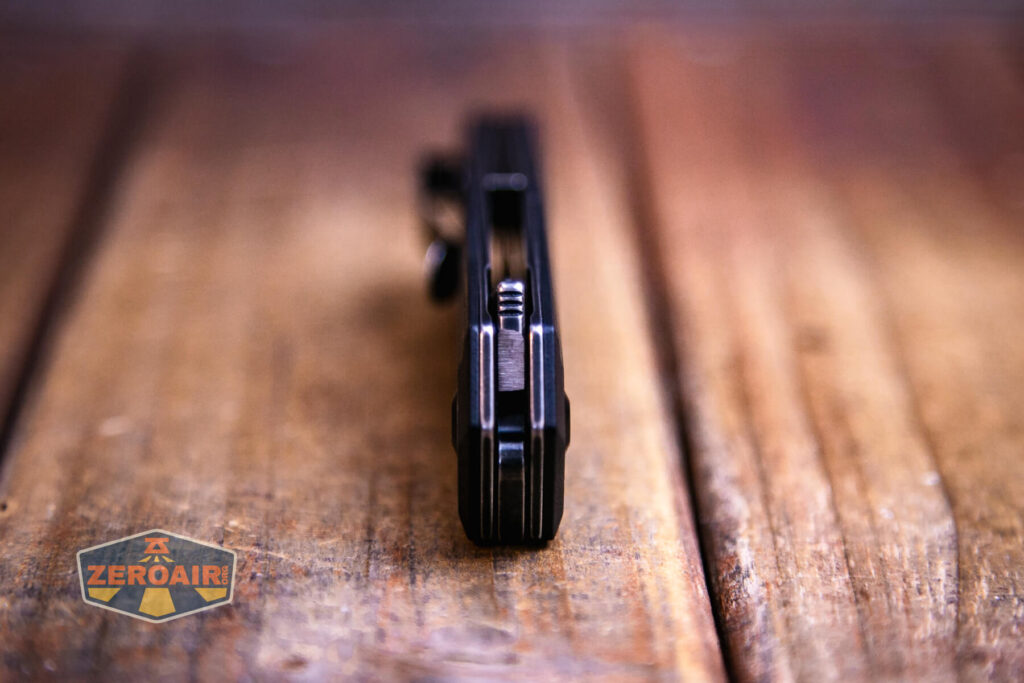 Kansept Integra flipper knife flipper jimping end view