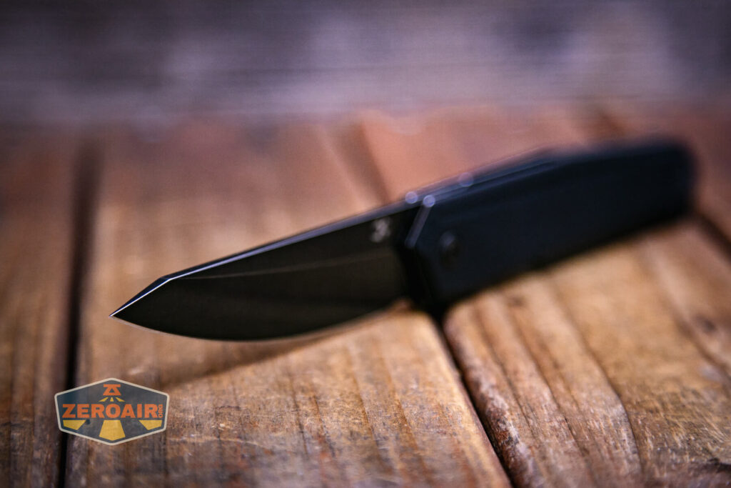 Kansept Integra flipper knife blade tip detail