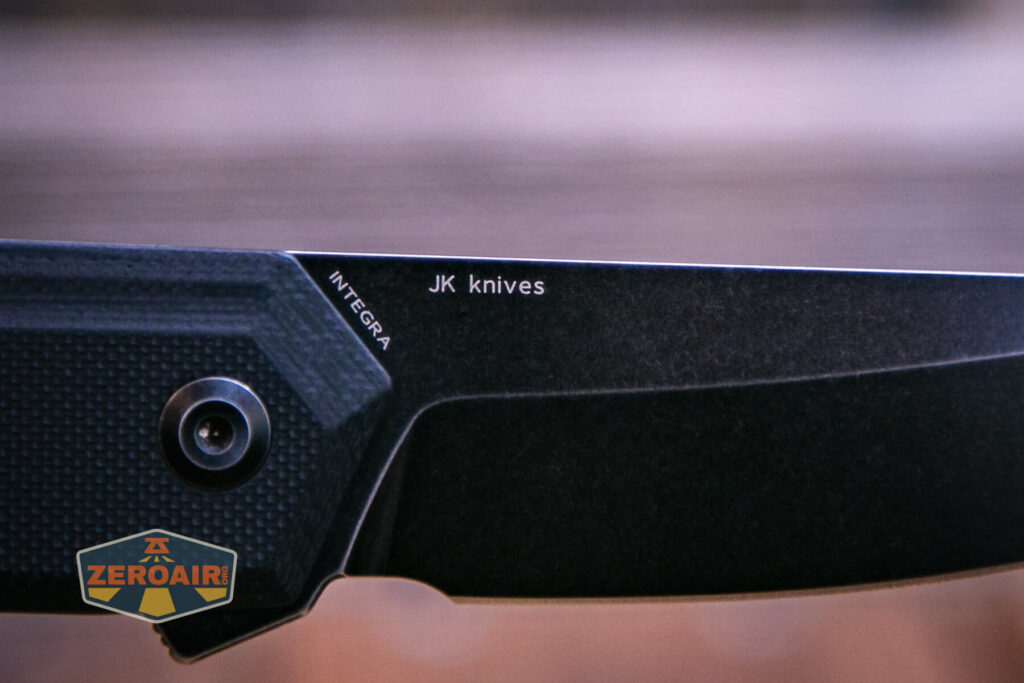 Kansept Integra flipper knife branding on blade