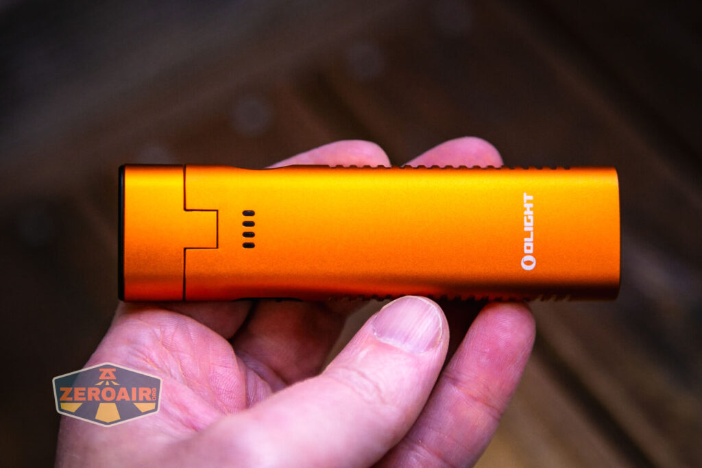 Olight Arkflex adjustable flashlight in hand