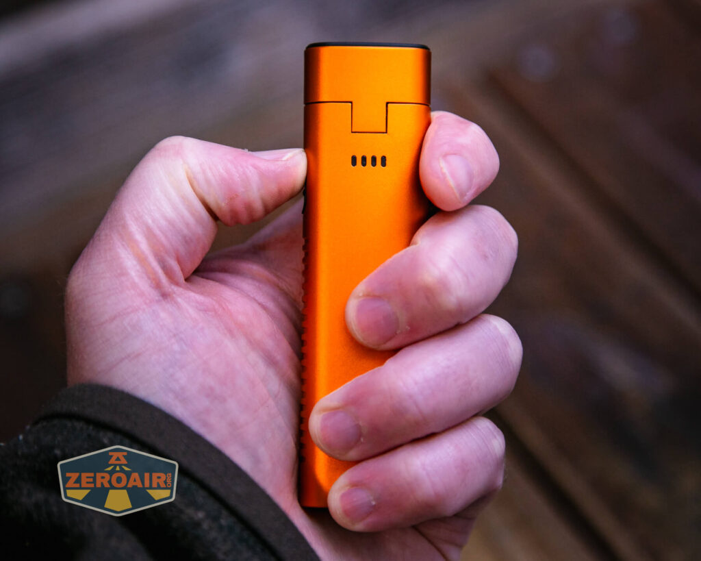 Olight Arkflex adjustable flashlight in hand