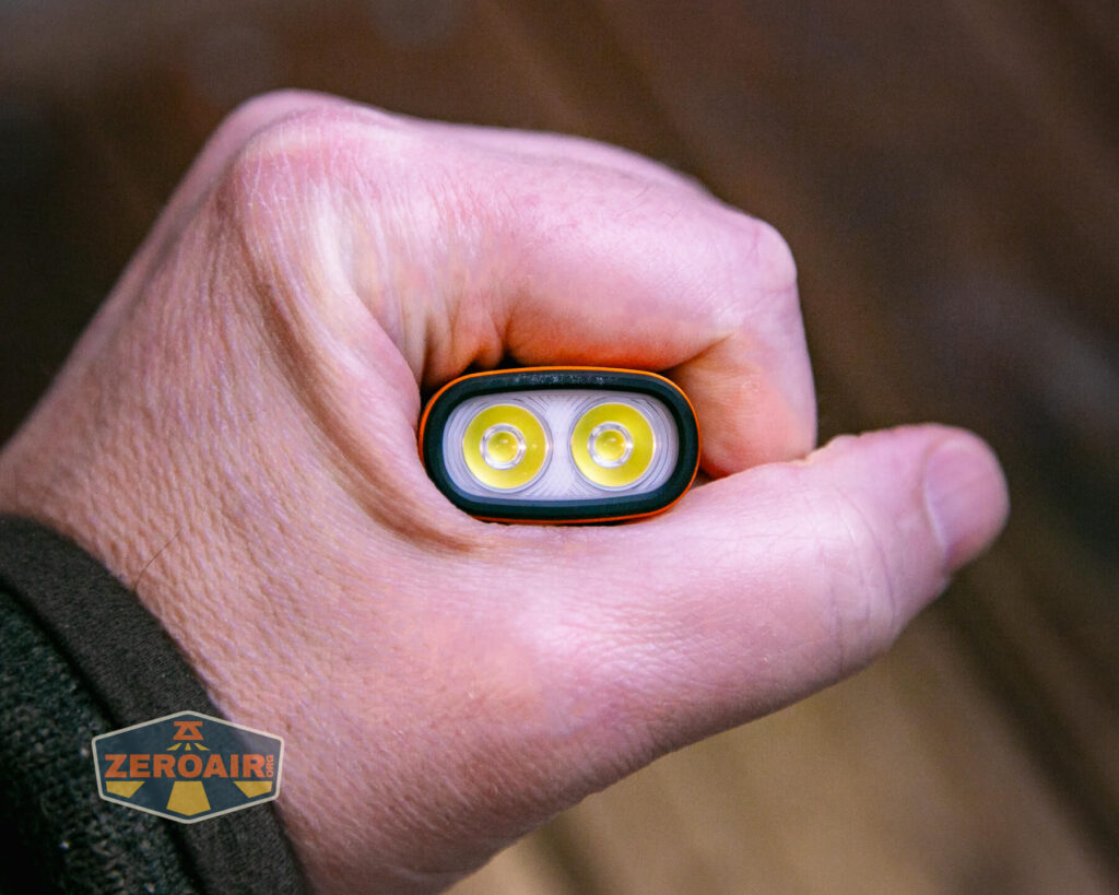 Olight Arkflex adjustable flashlight in hand