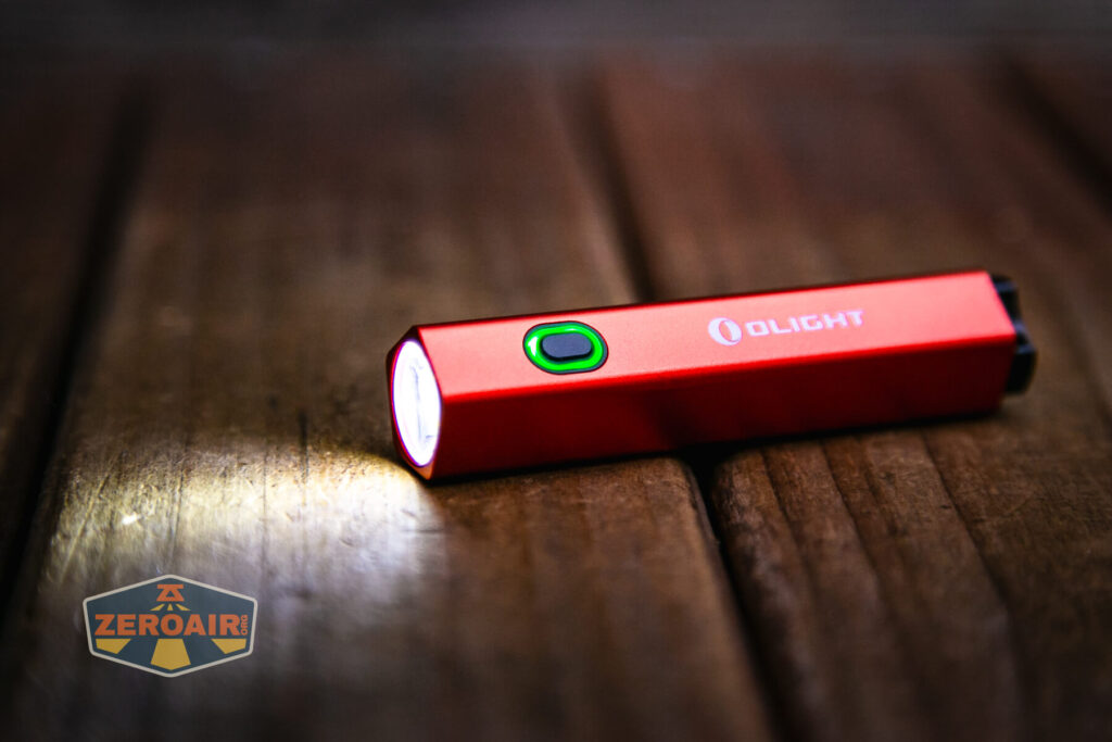 Olight Diffuse EDC Pocket flashlight switch lit in green