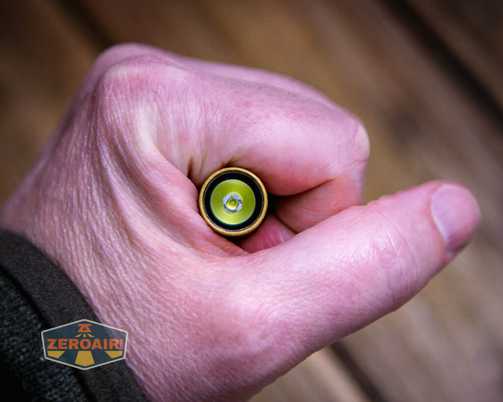 Olight i3T 2 EOS flashlight in hand