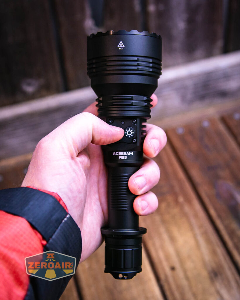Acebeam W35 Zoom LEP flashlight in hand