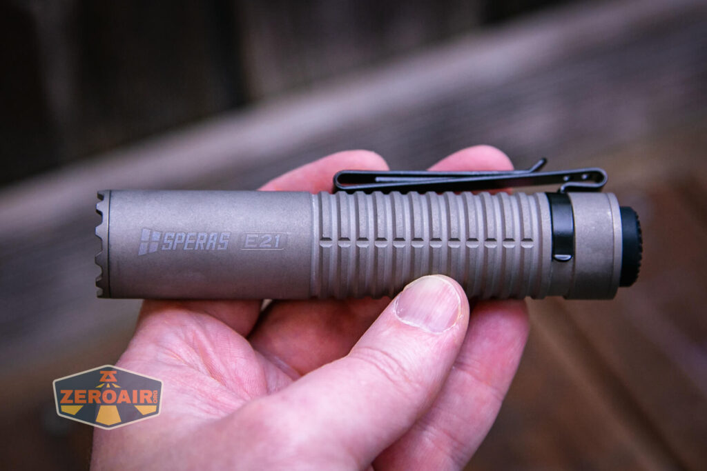 Speras E21 Titanium flashlight in hand