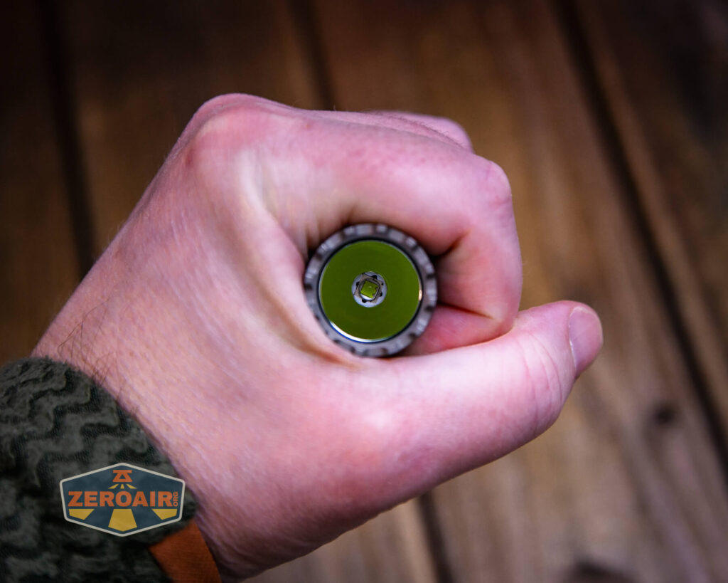 Speras E21 Titanium flashlight in hand