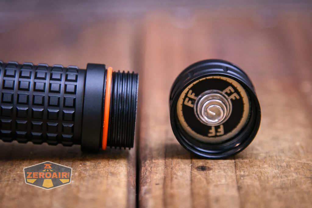 FireflyLite E12C flashlight tailcap off showing threads