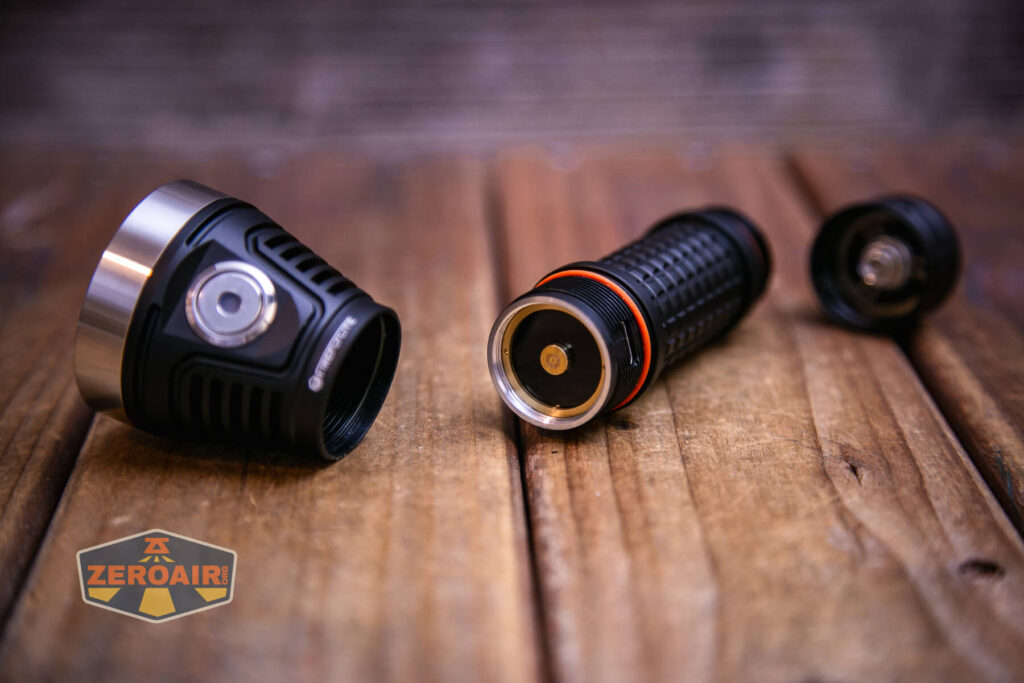 FireflyLite E12C flashlight charging end on the cell tube