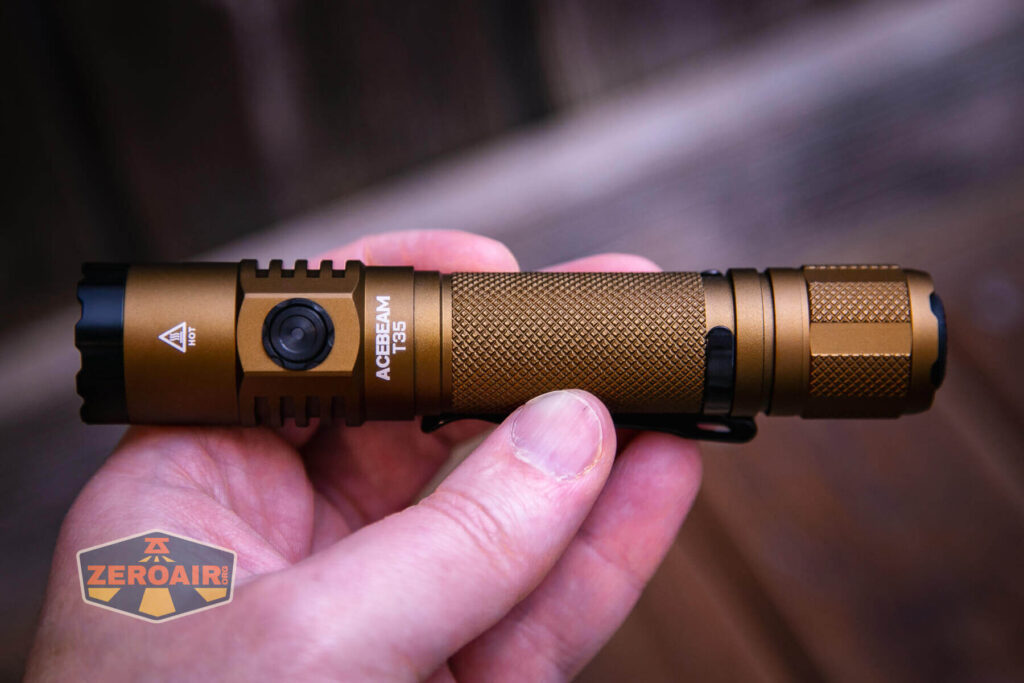 Acebeam T35 compact tactical flashlight in hand
