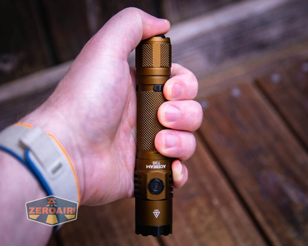Acebeam T35 compact tactical flashlight in hand