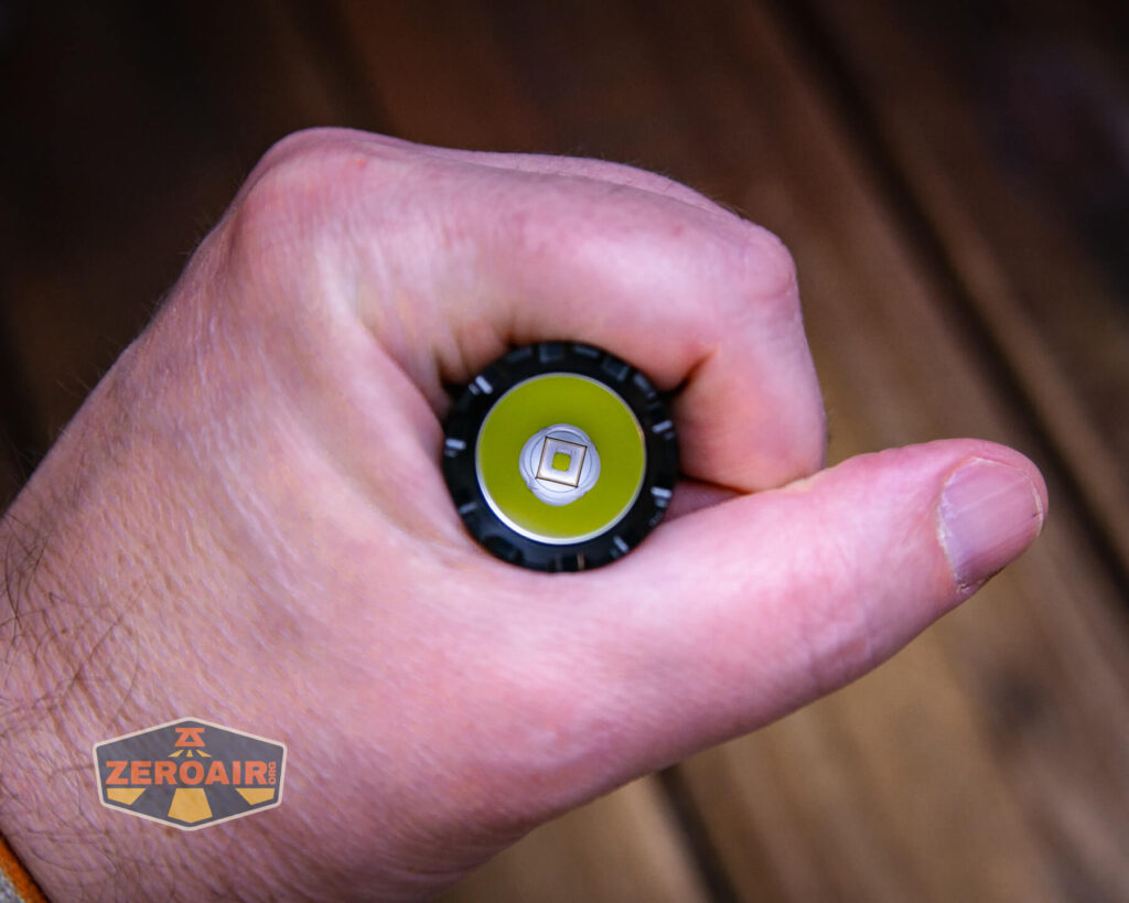 Acebeam T35 compact tactical flashlight in hand