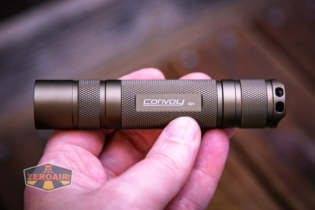 Convoy S2+ SFT40 3000K flashlight in hand