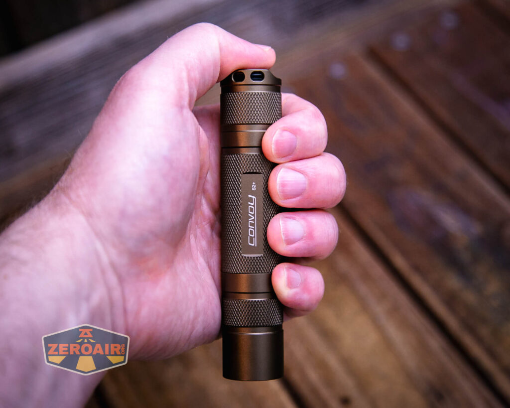 Convoy S2+ SFT40 3000K flashlight in hand